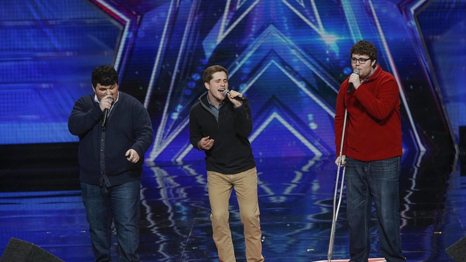 Triple Threat singing on the America's Got Talent stage