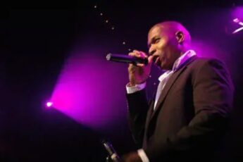 Lawrence Beamen singing on stage