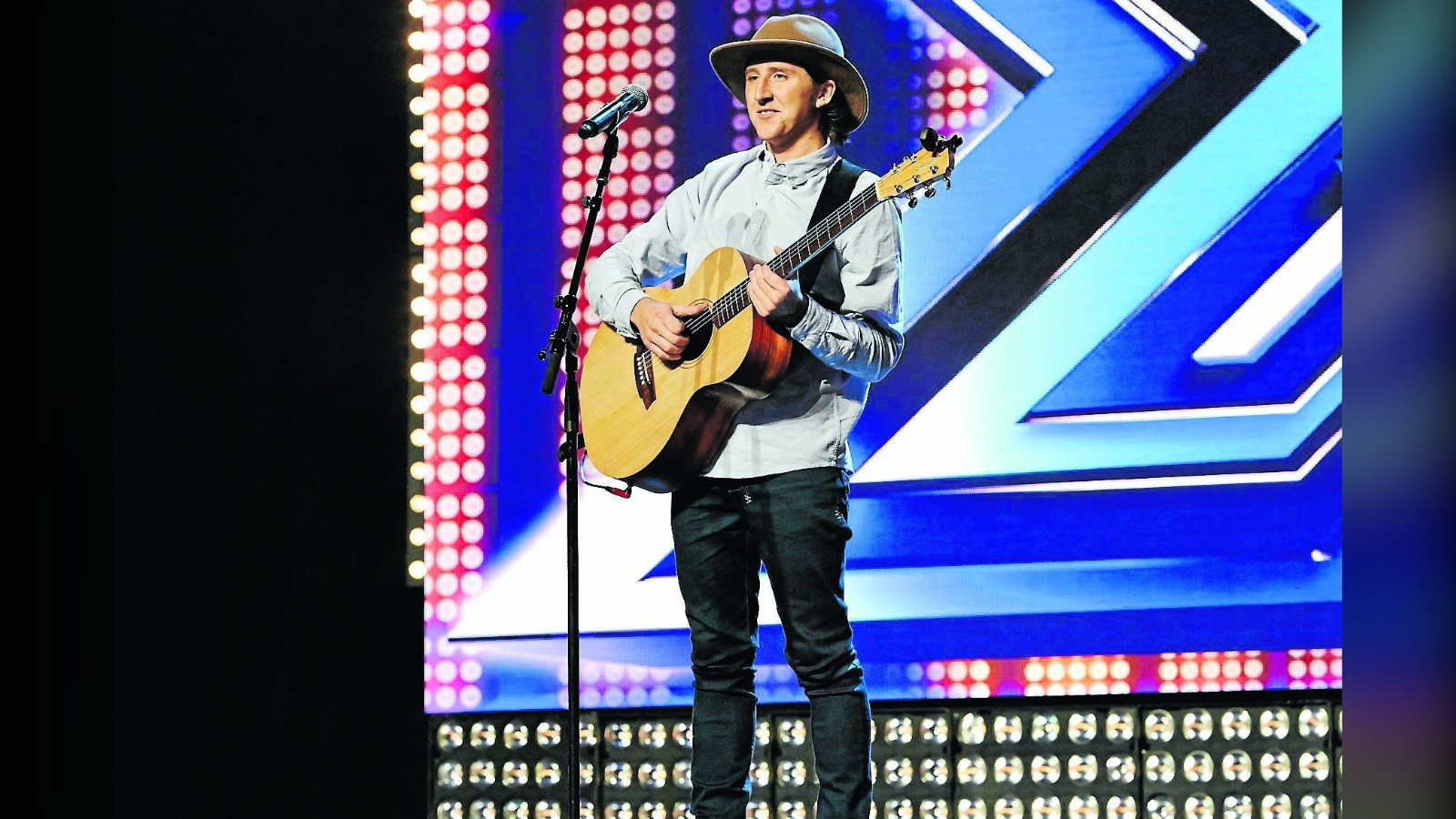 Tim Rosington singer with guitar